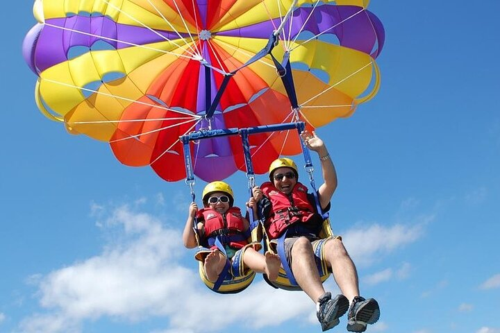 Pure Adrenaline Parasailing Collected in Uvero Alto - Photo 1 of 8
